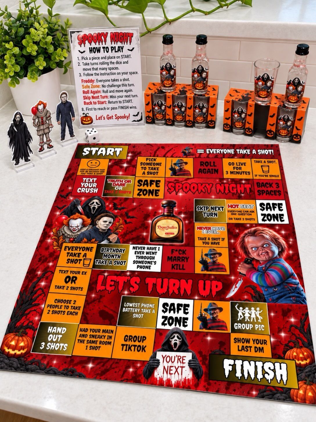 Halloween drinking board game with horror characters, miniatures, and shot glasses on table.