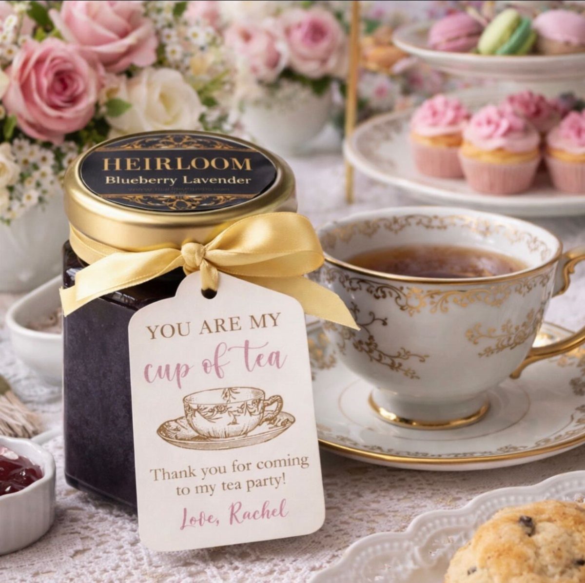 Jam jar with a thank you tag and gold ribbon at a tea party