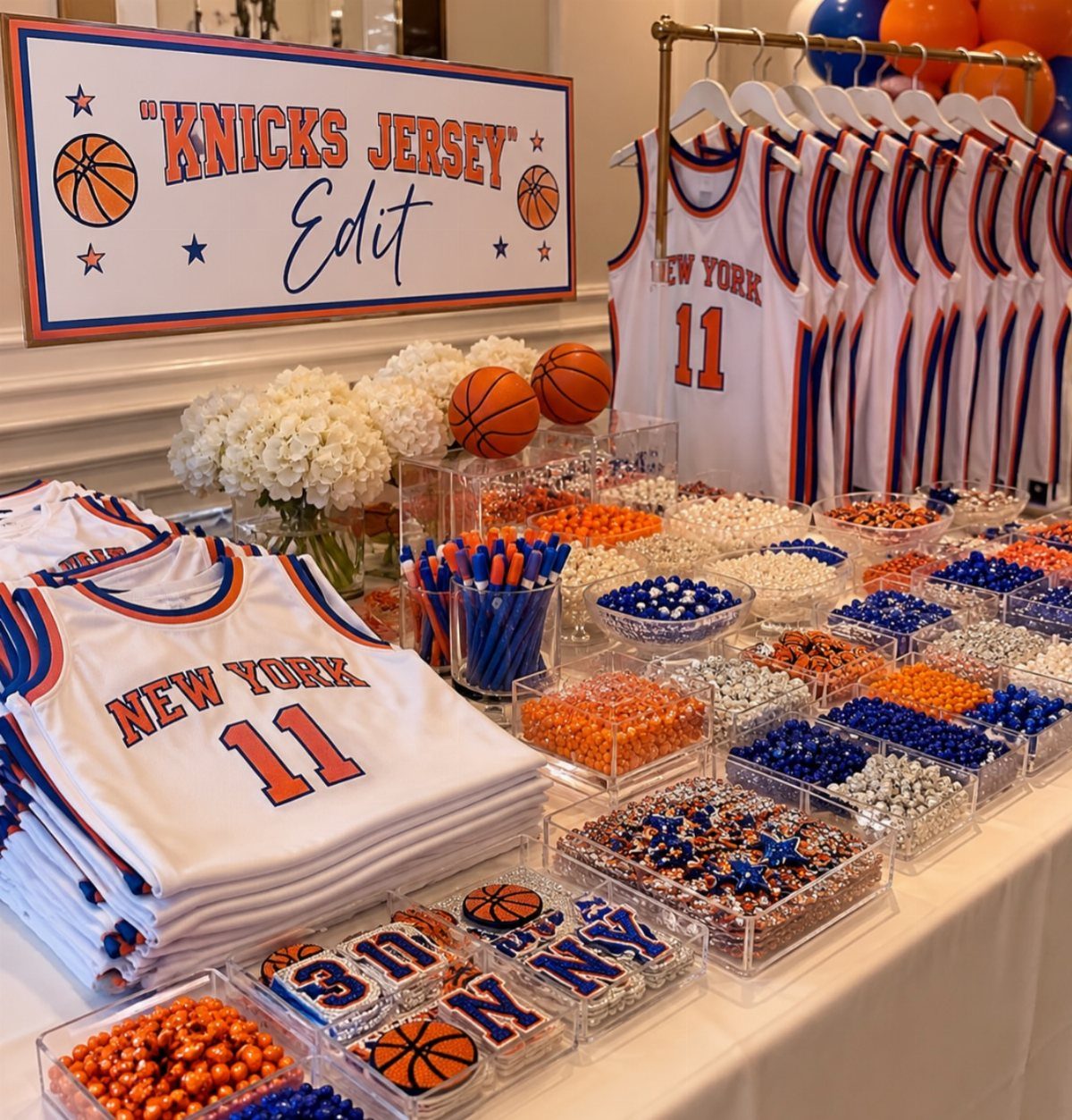 Basketball jersey decorating station with white jerseys, blue and orange beads, and markers.