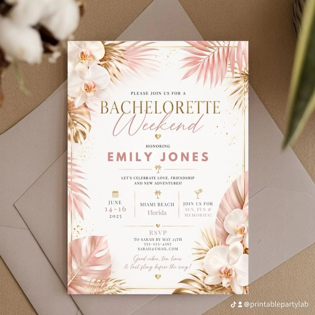 Beach themed bachelorette invitation with pink palm leaves and white orchids on envelope