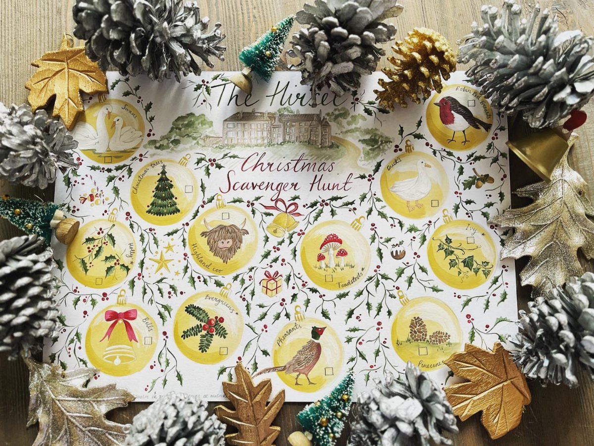Christmas Scavenger Hunt checklist surrounded by silver pinecones and gold autumn leaves.