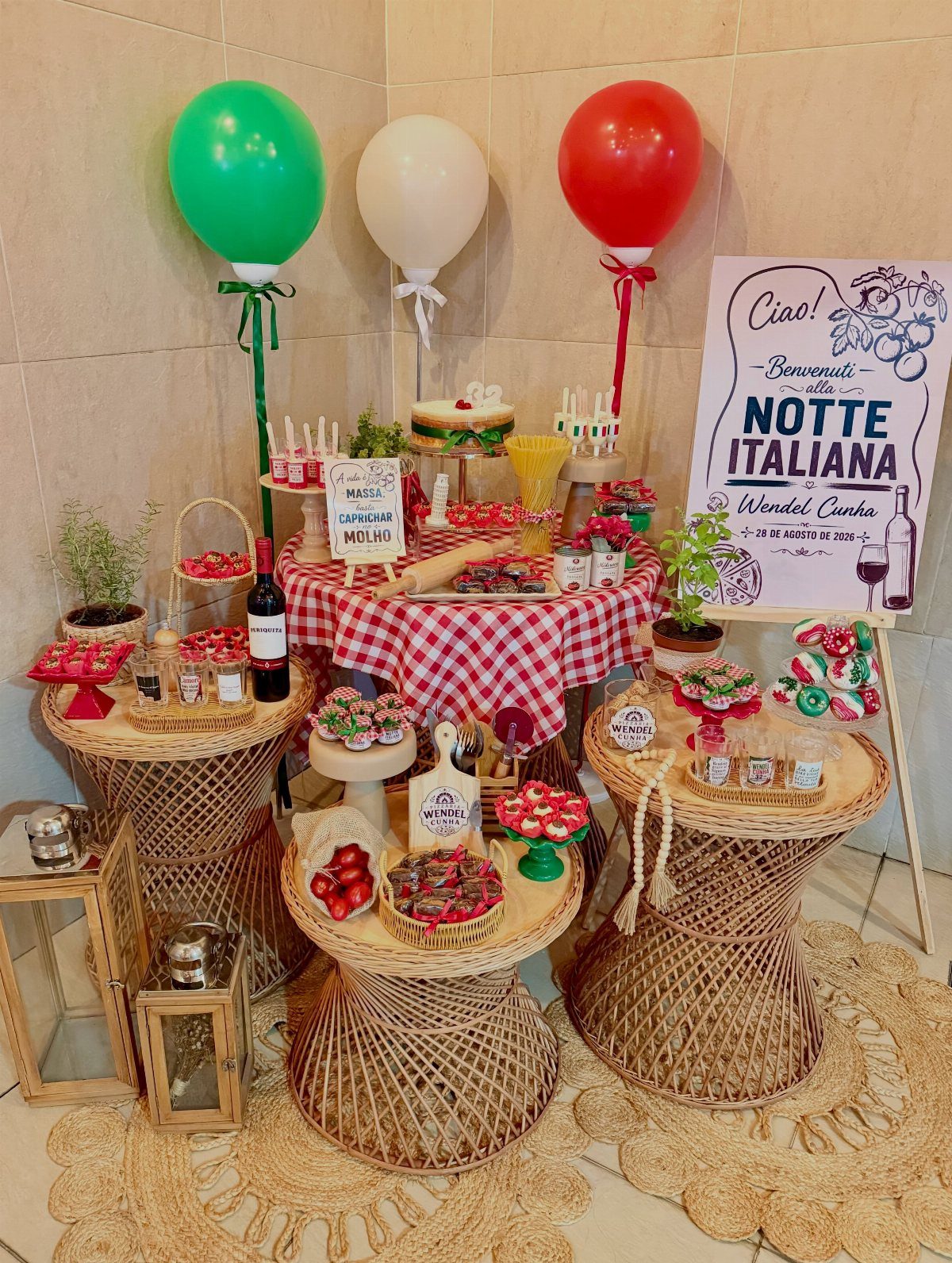 Italian party setup with red, white, and green balloons and checkered tablecloth.