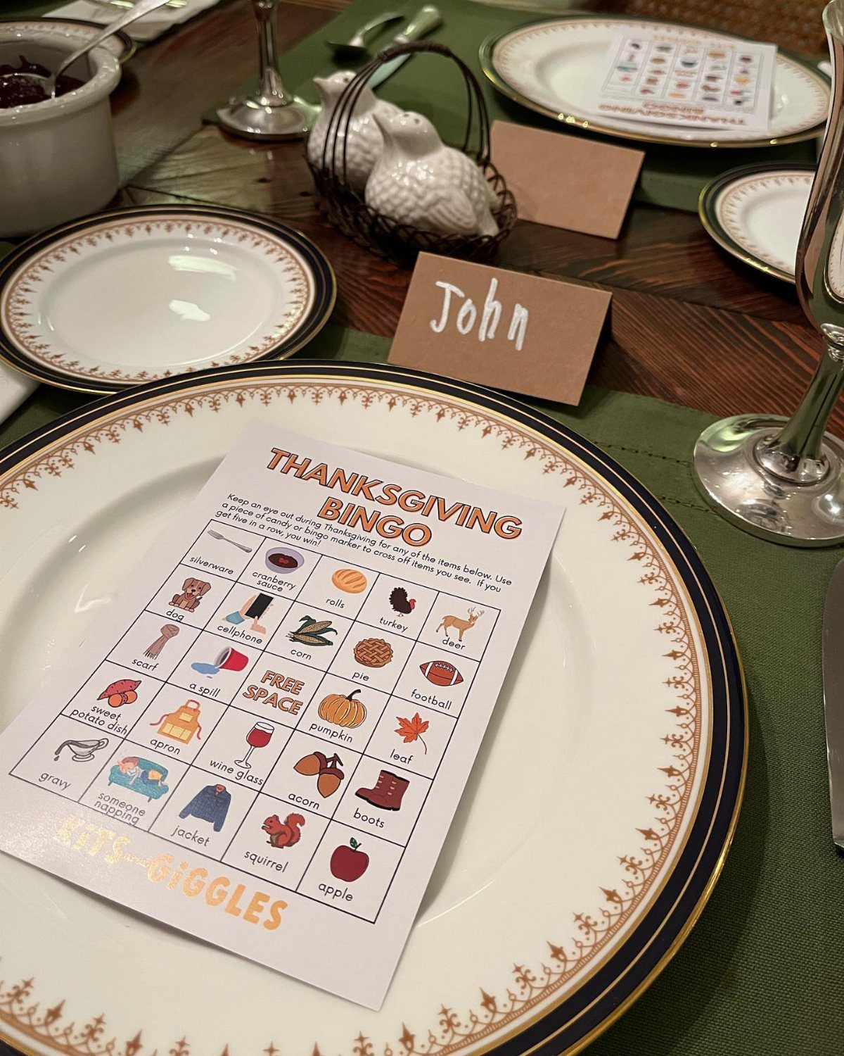 Thanksgiving table setting featuring a personalized place card for John and bingo game.