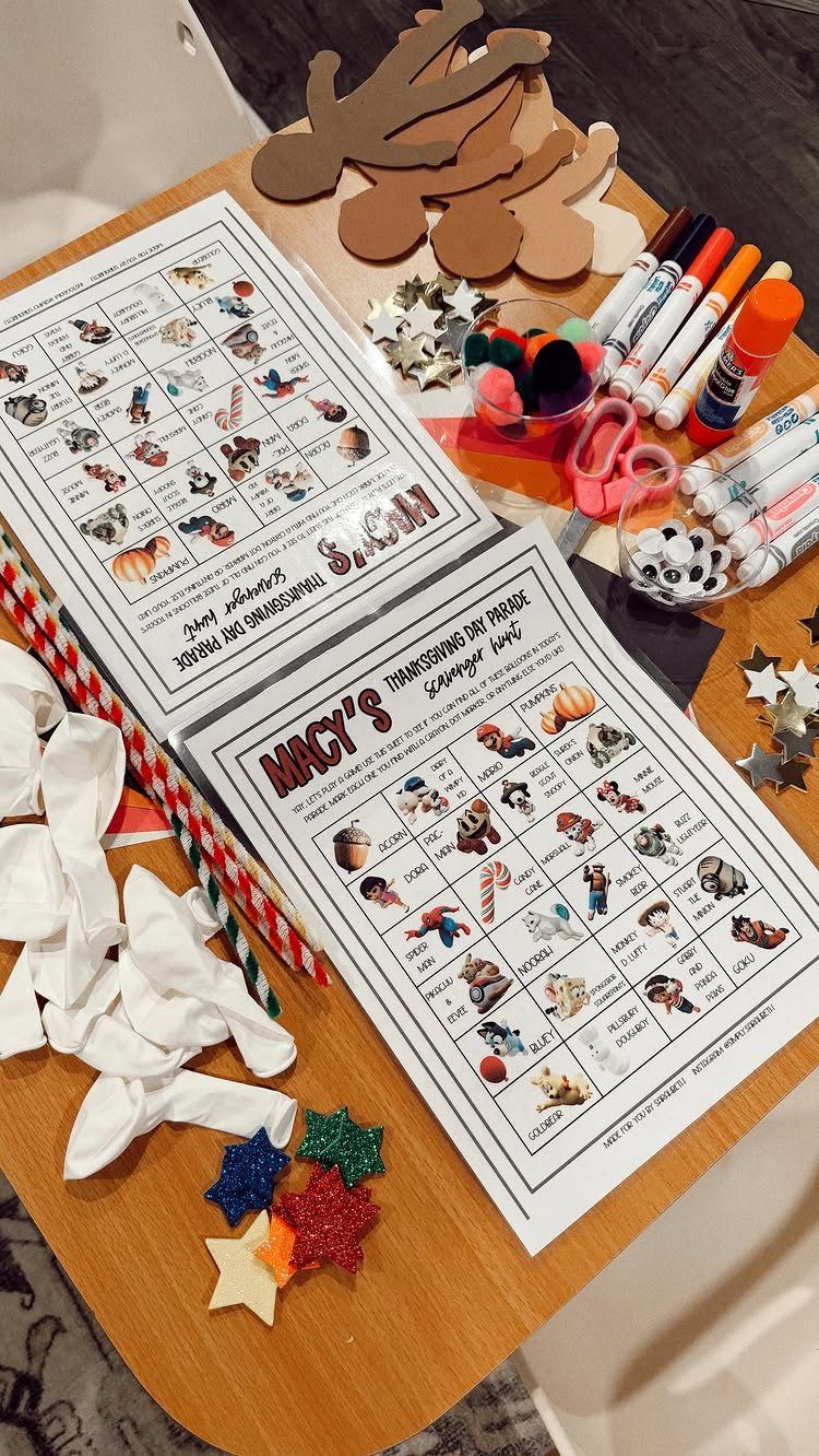 Thanksgiving scavenger hunt lists on a table with markers and craft supplies.